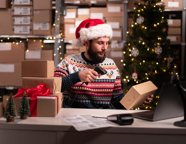 Christmas delivery barcode scan in warehouse